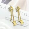 Louis Vuitton diamond floral tassel letter earrings