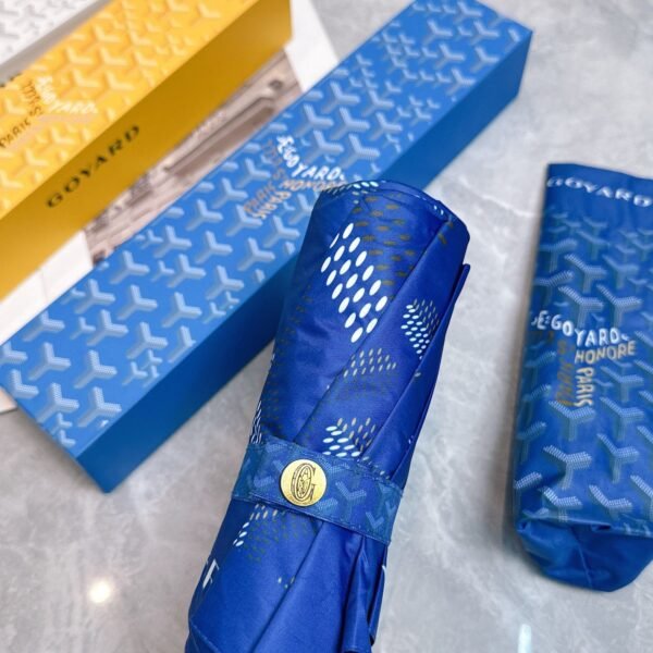 Goyard tri-fold sun-protective umbrella has a black inner coating that effectively blocks 99% of UV rays.