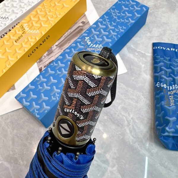 Goyard tri-fold sun-protective umbrella has a black inner coating that effectively blocks 99% of UV rays.