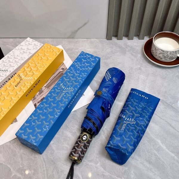 Goyard tri-fold sun-protective umbrella has a black inner coating that effectively blocks 99% of UV rays.