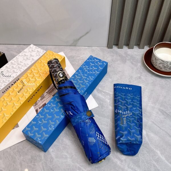 Goyard tri-fold sun-protective umbrella has a black inner coating that effectively blocks 99% of UV rays.