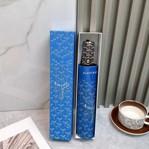 Goyard tri-fold sun-protective umbrella has a black inner coating that effectively blocks 99% of UV rays.