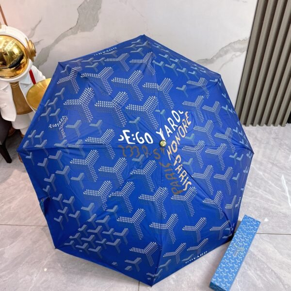 Goyard tri-fold sun-protective umbrella has a black inner coating that effectively blocks 99% of UV rays.