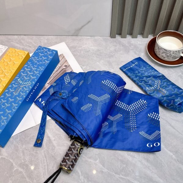 Goyard tri-fold sun-protective umbrella has a black inner coating that effectively blocks 99% of UV rays.