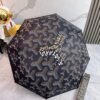 Goyard tri-fold sun-protective umbrella has a black inner coating that effectively blocks 99% of UV rays.