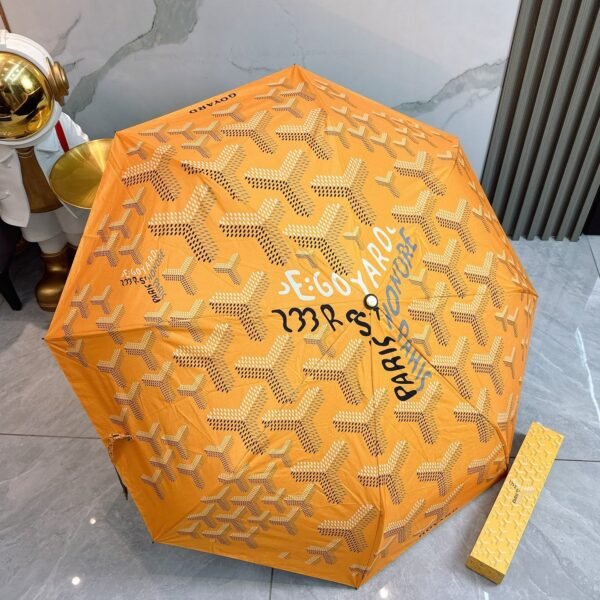 Goyard tri-fold sun-protective umbrella has a black inner coating that effectively blocks 99% of UV rays.