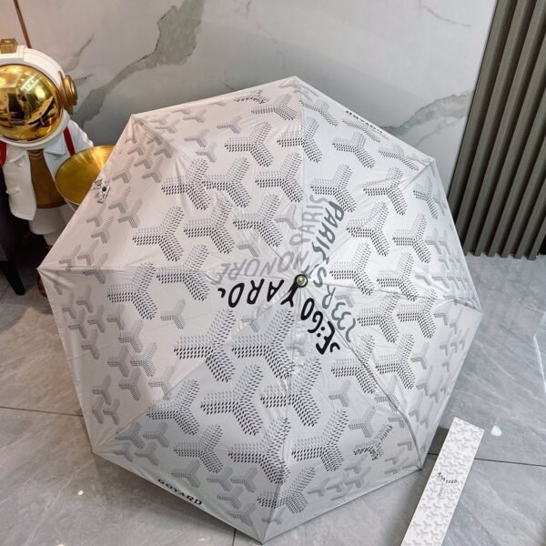 Goyard tri-fold sun-protective umbrella has a black inner coating that effectively blocks 99% of UV rays.