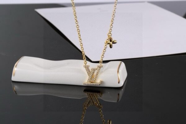 LV golden letter necklace