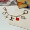 Louis Vuitton keychain bag pendant One of the hallmarks of the Fleur de Monogram bag