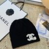 CHANEL knitted wool blend hat and scarf set