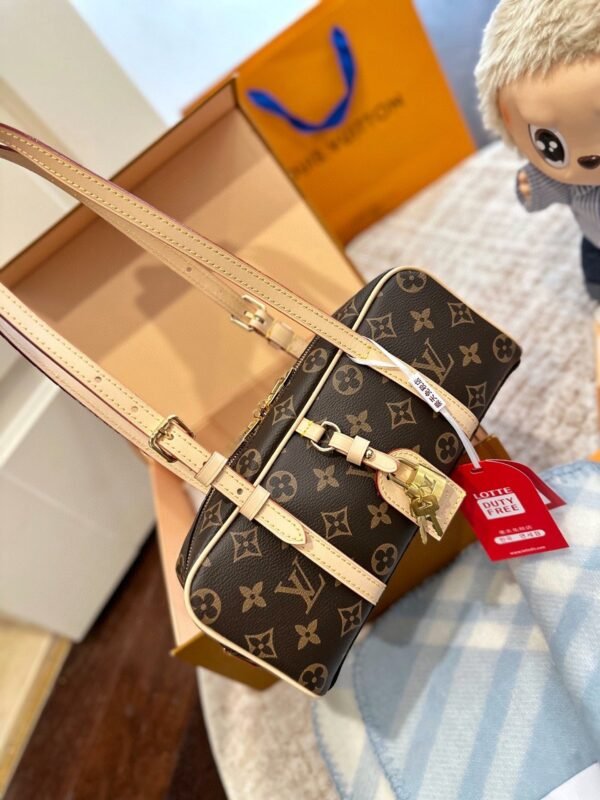 Louis Vuitton’s new hangon bowling bag Size: 25x12cm