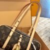 Louis Vuitton’s new hangon bowling bag Size: 25x12cm
