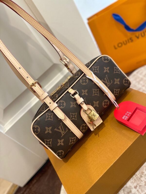 Louis Vuitton’s new hangon bowling bag Size: 25x12cm