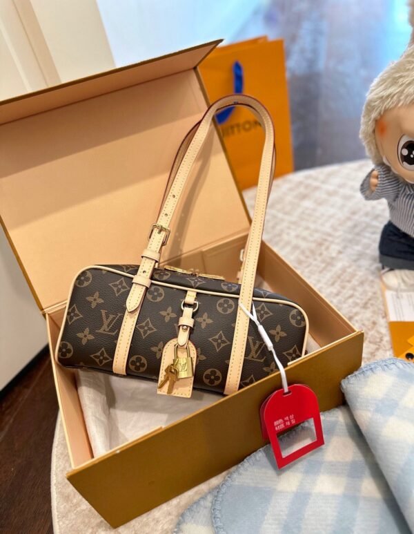Louis Vuitton’s new hangon bowling bag Size: 25x12cm