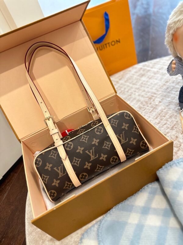 Louis Vuitton’s new hangon bowling bag Size: 25x12cm