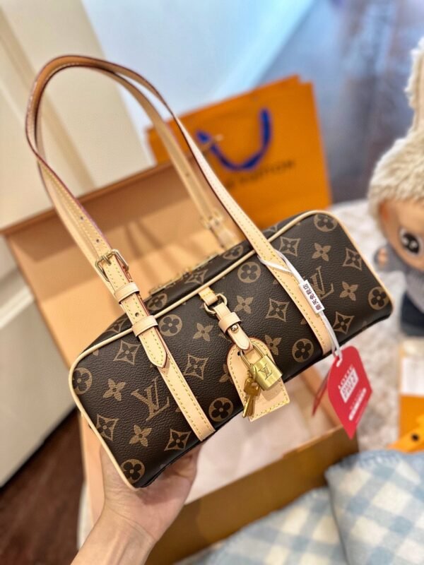 Louis Vuitton’s new hangon bowling bag Size: 25x12cm