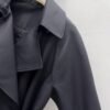 Loewe’s new autumn and winter lapel bud trench coat mid-length design