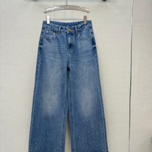 Miu Miu style jeans with rhinestone embellishments on the cuffs, made with high-quality fabric and a special washing process.