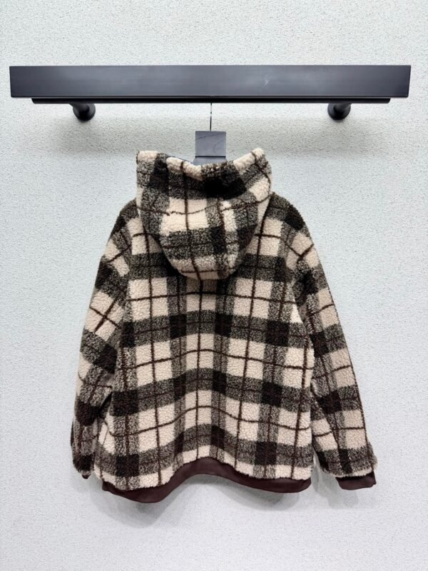 Miu Miu plaid reversible denim jacket with shearling lining – a winter essential.