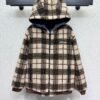 Miu Miu plaid reversible denim jacket with shearling lining – a winter essential.