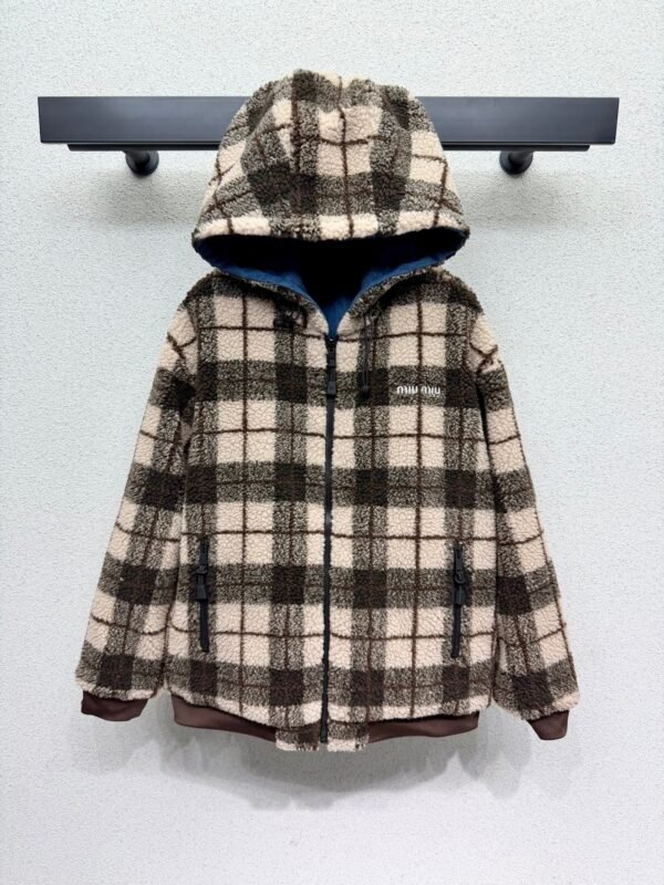 Miu Miu plaid reversible denim jacket with shearling lining – a winter essential.