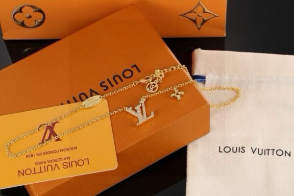 LV golden letter necklace