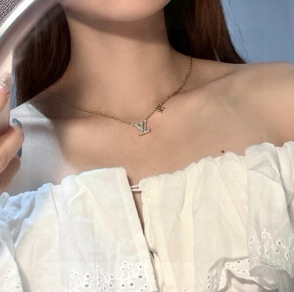 LV golden letter necklace