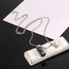 lv letter perfume bottle necklace