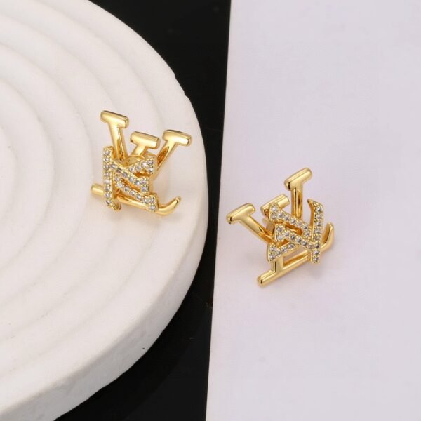 LV golden letter stud earrings