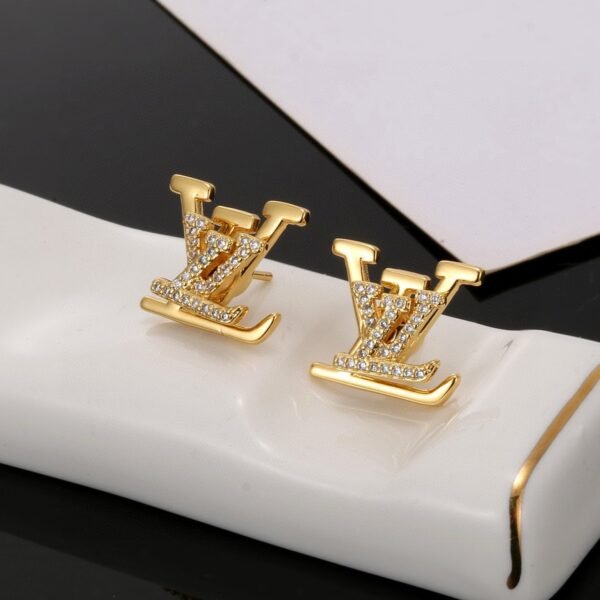 LV golden letter stud earrings