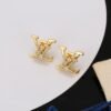 LV golden letter stud earrings