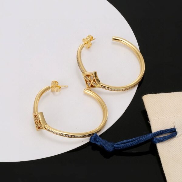 Louis Vuitton stud earrings
