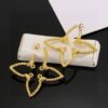 LV four-leaf clover hollowed-out twisted earrings