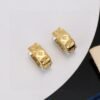 LV four-leaf clover hollowed-out twisted earrings