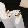 LV four-leaf clover hollowed-out twisted earrings