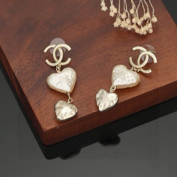 Chanel light gold heart heart earrings