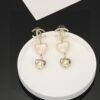 Chanel light gold heart heart earrings