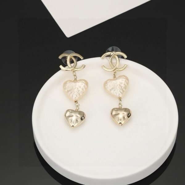 Chanel light gold heart heart earrings