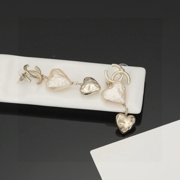 Chanel light gold heart heart earrings