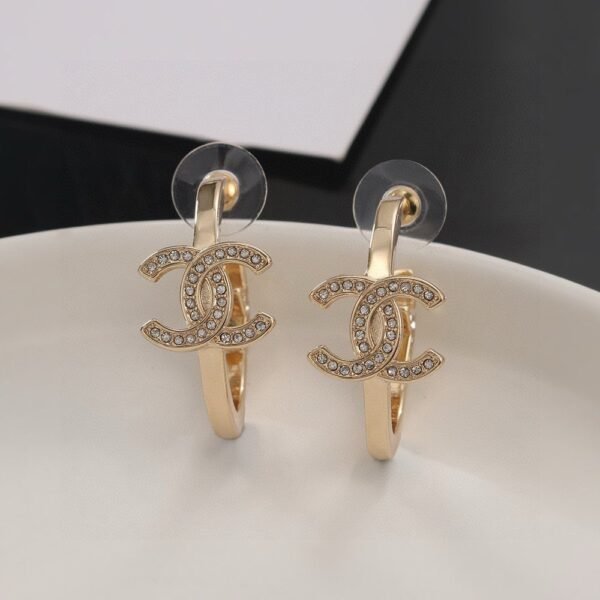 Chanel light gold earrings