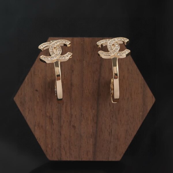 Chanel light gold earrings