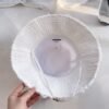 jacquemus raw edge drawstring bucket hat