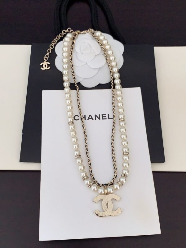 Chanel black leather pearl double necklace