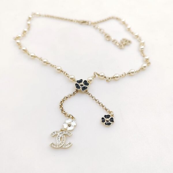 Chanel black and white flower necklace