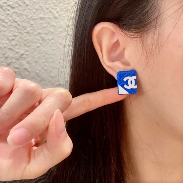 Chanel diamond-shaped double C stud earrings