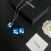Chanel diamond-shaped double C stud earrings