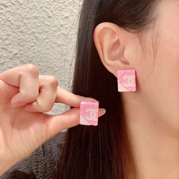 Chanel diamond-shaped double C stud earrings