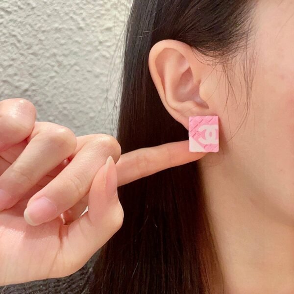 Chanel diamond-shaped double C stud earrings