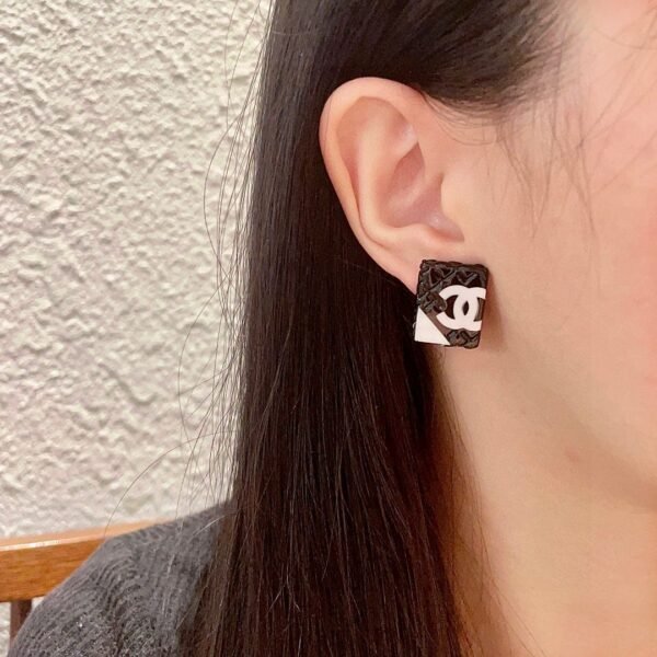 Chanel diamond-shaped double C stud earrings