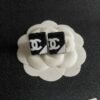Chanel diamond-shaped double C stud earrings